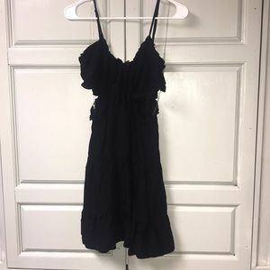 Black dress with side cut outs.